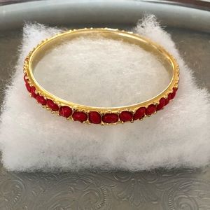 Kenneth Jay Lane red stone and gold bracelet